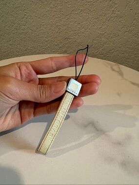 Bvlgari Beige Leather Strap Charm for phone